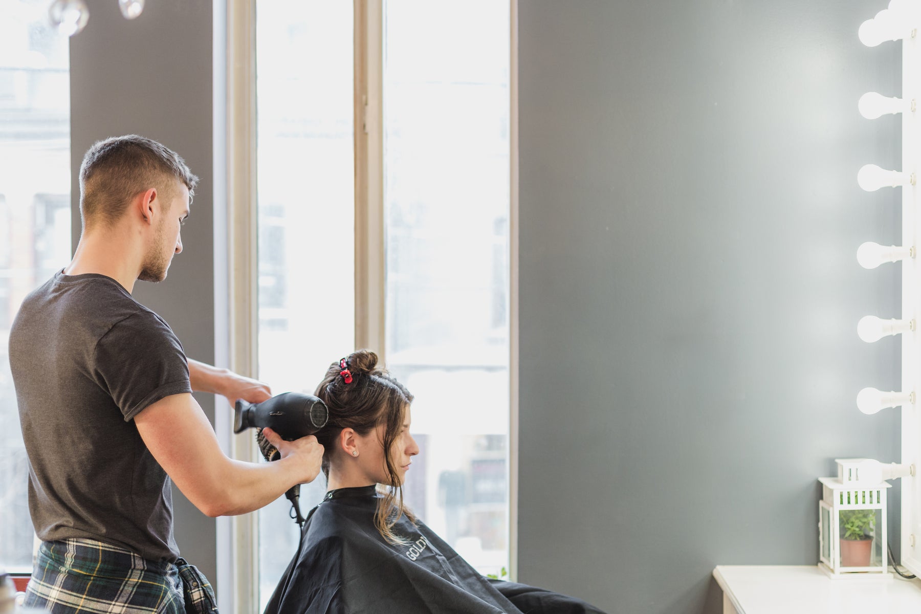 Stylist cutting hair at Hair 2000 in San Rafael